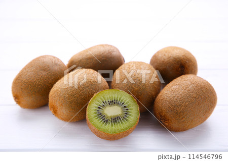 Fresh kiwi fruit on white wooden background 114546796