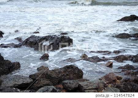 Beautiful landscape of Rocky coastline and blue sea with cloud storm on the sky in Thailand.Seascape concept 114547824