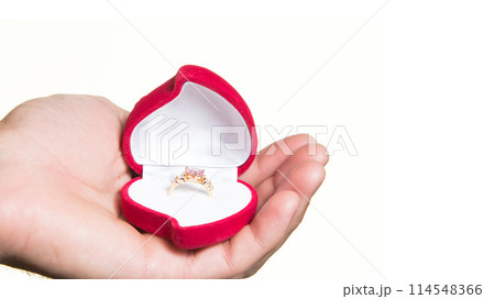 Ring in an open box in a man's hand, the proposal - isolate 114548366