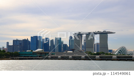 Singapore CBD city skyline view from Marina Barrage, with beautiful blue sky and white cloud. Singapore CBD city skyline view from Marina Barrage, with beautiful blue sky and white cloud. 114549061