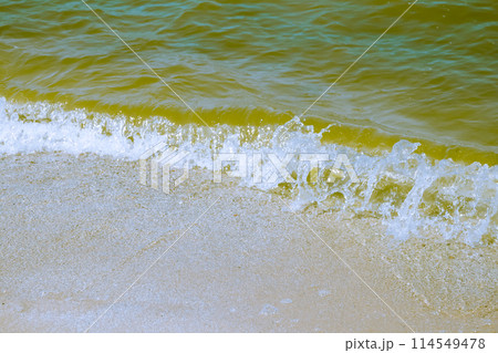 Sea wave on a sandy beach 114549478