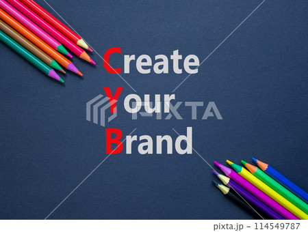 CYB Create your brand symbol. Concept words CYB Create your brand on beautiful black paper. Beautiful black background. Colored pencils. Business CYB Create your brand concept. Copy space. 114549787