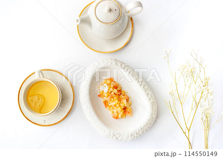 Light breakfast in a restaurant with green tea and dessert Light breakfast in a restaurant with green tea and dessert 114550149