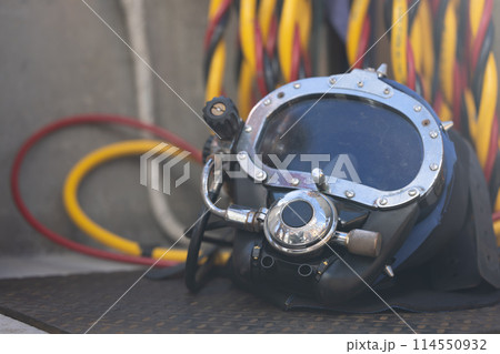 Closeup of commercial diving helmet on the boat Closeup of commercial diving helmet on the boat 114550932