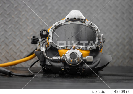 Closeup photo of commercial diving helmet 114550958