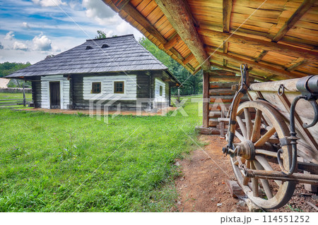 Amazing summer scene of traditional romanian peasant houses. 114551252