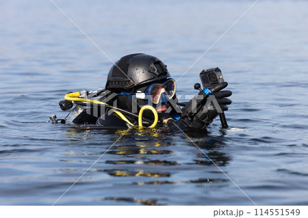 Canadian military scuba diver in water with camera 114551549