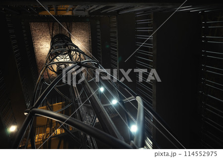 Elevator shaft in historic Prague tower structure Elevator shaft in historic Prague tower structure 114552975