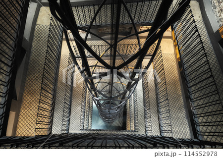 Elevator shaft in historic Prague tower structure Elevator shaft in historic Prague tower structure 114552978