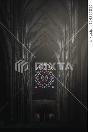 Gothic cathedral interior with stained glass window Gothic cathedral interior with stained glass window 114553019