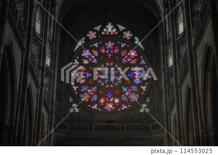 Gothic cathedral interior with stained glass window 114553025