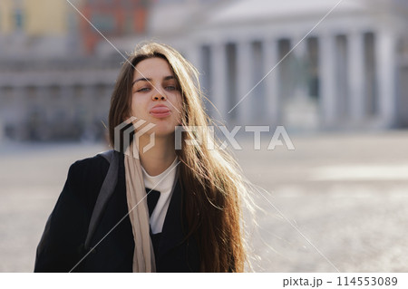 Fashionable woman on historic city square Fashionable woman on historic city square 114553089