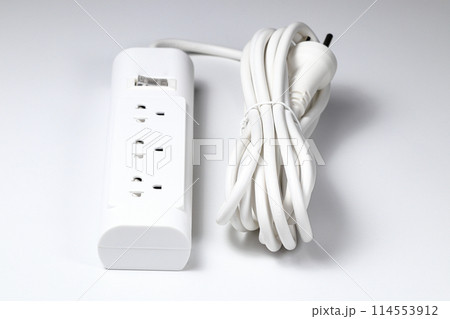 Closeup of electrical power strip or extension block on white background. 114553912