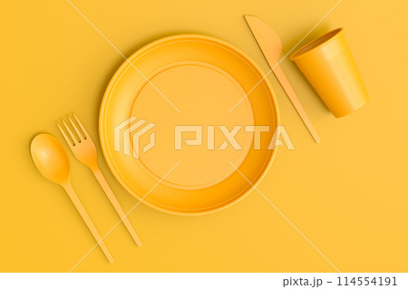 Set of disposable utensils like plate, folk, spoon,knife, cup and pepper mill 114554191