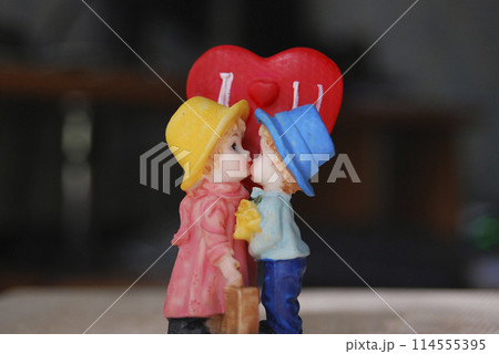 Couples in love. A heartfelt kiss from two stylish young people. Couples in love. A heartfelt kiss from two stylish young people. 114555395