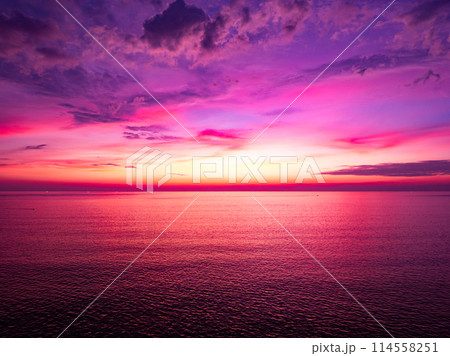 Aerial view sunset sky, Beautiful Light Sunset or sunrise over sea,Colorful dramatic majestic scenery sunset Sky, Amazing clouds and small waves in the ocean, Wonderful light cloud background Aerial view sunset sky, Beautiful Light Sunset or sunrise over sea,Colorful dramatic majestic scenery sunset Sky, Amazing clouds and small waves in the ocean, Wonderful light cloud background 114558251