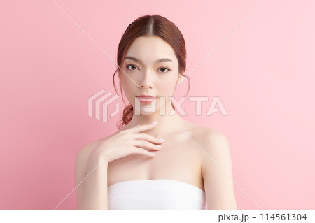 Beautiful young asian woman with clean fresh skin on pink background, Face care, Facial treatment, Cosmetology, beauty and spa, Asian women portrait. 114561304