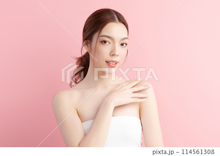 Beautiful young asian woman with clean fresh skin on pink background, Face care, Facial treatment, Cosmetology, beauty and spa, Asian women portrait. 114561308