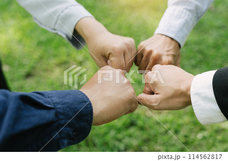 Group of volunteer people joining for cooperation about global community teamwork with join hand together, World environment day, sustainable development goal. 114562817