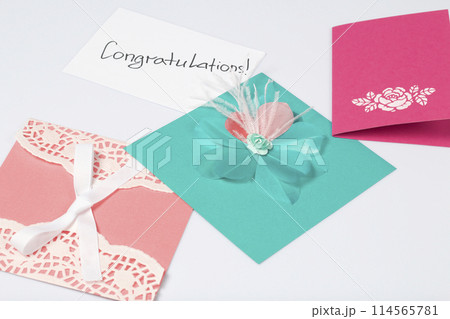 Handmade greeting card. On the white background. Original gift. 114565781