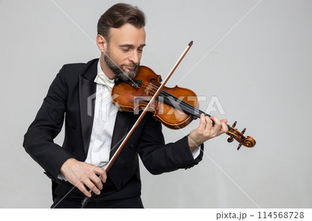 Bearded fiddler with violin instrument Bearded fiddler with violin instrument 114568728