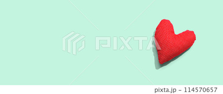 Appreciation theme with a handmade heart cushion 114570657