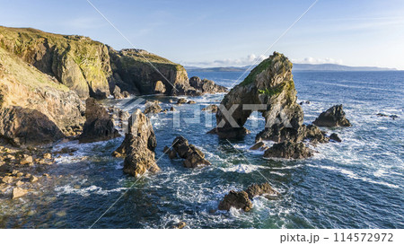 Aerial view of the Crohy Head Sea Arch, County Donegal - Ireland. Aerial view of the Crohy Head Sea Arch, County Donegal - Ireland. 114572972