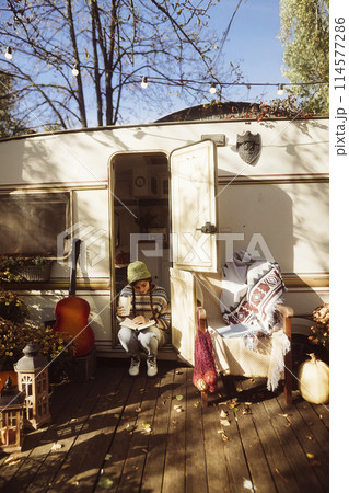 A stunning depiction of a fashionable young lady in retro hippie style. A stunning depiction of a fashionable young lady in retro hippie style. 114577286