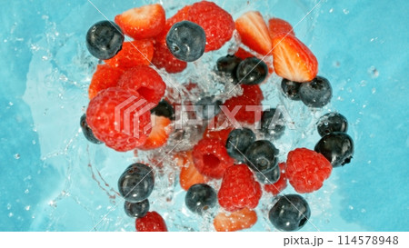 Freeze Motion of Berries Falling into Water, Splashing. Freeze Motion of Berries Falling into Water, Splashing. 114578948