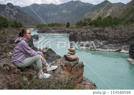 Woman at the river Katun 114580599