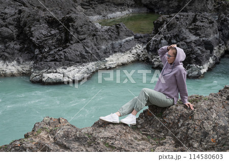 Woman at the river Katun 114580603