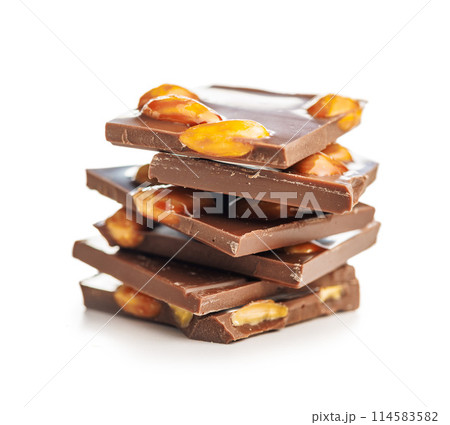 Broken chocolate bar with almonds isolated on white background. 114583582