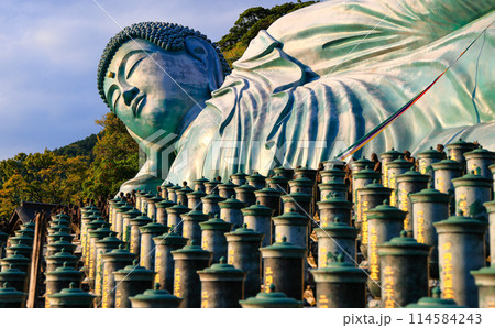 The largest reclining bronze Buddha statue in the world at nanzo-in Temple, Fukuoka Prefecture, Japan. The largest reclining bronze Buddha statue in the world at nanzo-in Temple, Fukuoka Prefecture, Japan. 114584243