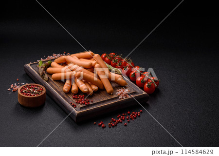 Delicious vegetarian or vegan sausages with salt, spices and herbs Delicious vegetarian or vegan sausages with salt, spices and herbs 114584629