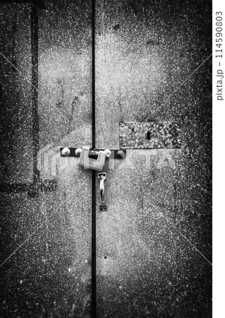 Metal door with padlock Metal door with padlock 114590803
