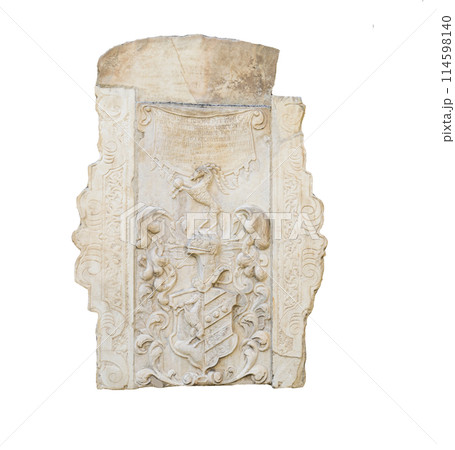 the old tombstones and reliefs on the wall 114598140