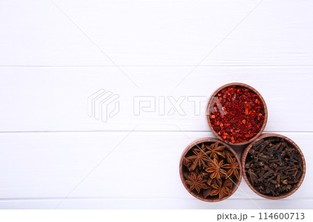 Spices mix on a white wooden background. Top view Spices mix on a white wooden background. Top view 114600713