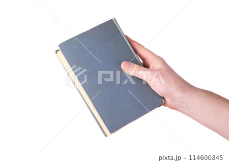 Man hand holding grey old book on white background Man hand holding grey old book on white background 114600845