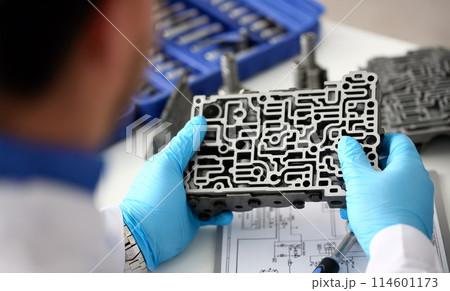 The auto repair service repairman in automatic 114601173