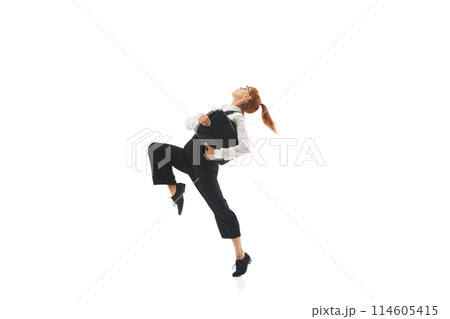 Focused woman in formal wear, manager in motion wit brief case, running to work isolated on white background. Focused woman in formal wear, manager in motion wit brief case, running to work isolated on white background. 114605415