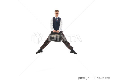 Happy smiling man in formal wear, employee, office worker jumping with briefcase isolated on white background. Getting promotion Happy smiling man in formal wear, employee, office worker jumping with briefcase isolated on white background. Getting promotion 114605466