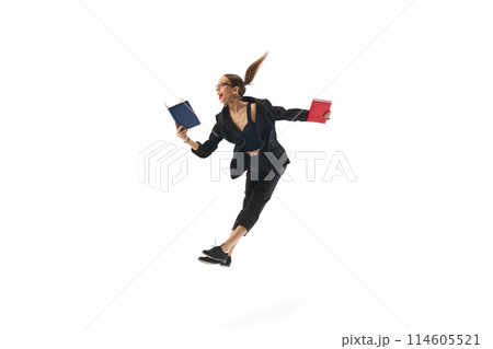 Dynamic image of emotional woman, employee in jump looking on documents with emotional face isolated on white background. Professional challenges 114605521