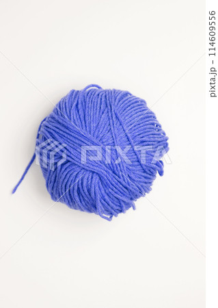 Color yarn for knitting, white background. Top view. Copy space, flat lay Color yarn for knitting, white background. Top view. Copy space, flat lay 114609556