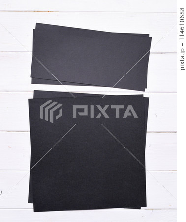 stacks of black paper 114610688