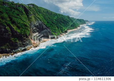 Mountain rocky landscape with coastline and turquoise ocean in Bali. Aerial view 114611306