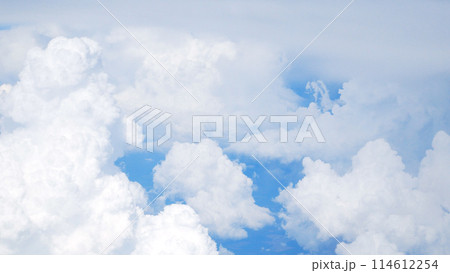 White clouds against a blue sky. View from above. 114612254