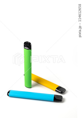 disposable electronic cigarettes of different flavors on a white background disposable electronic cigarettes of different flavors on a white background 114612658