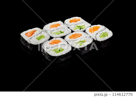 Salmon and cucumber maki sushi on black background Salmon and cucumber maki sushi on black background 114612770