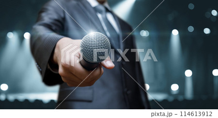 Man holding microphone . 114613912