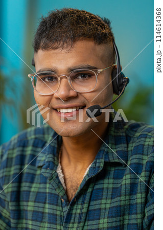 Business man wearing headset freelance worker call center or support service operator helpline 114614368
